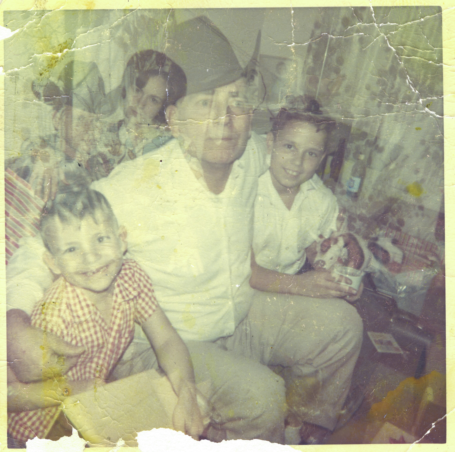 Damaged photo — before